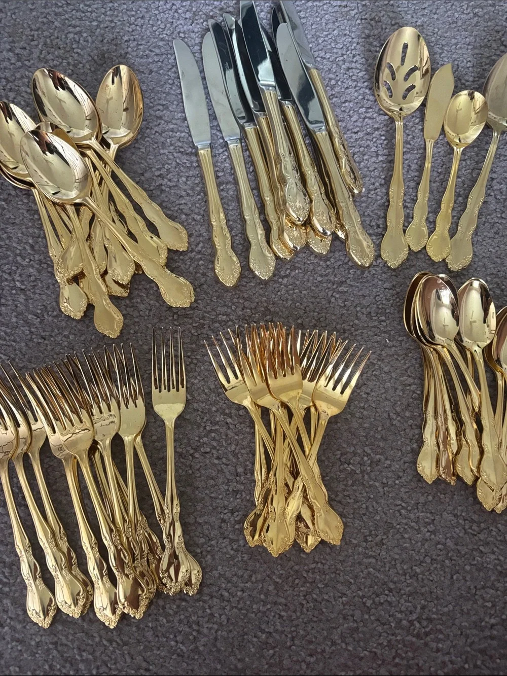 61 pieces used Royal Limited gold plated stainless flatware roses